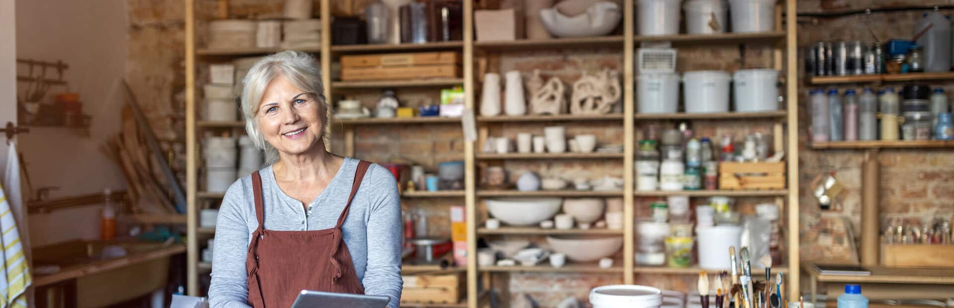 woman smiling after meeting with a small business financial advisor