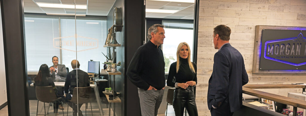 Wealth advisor discussing retirement planning with clients